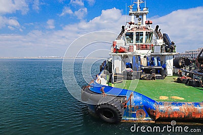 OSV boat, offshore supply vessel stand moored in harbor Stock Photo