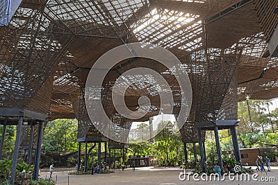 OsÃ© JerÃ³nimo Triana Orquideorama Botanical Garden is a large open room with plants, calateas, orchids, anthuriums, bullets, brom Editorial Stock Photo