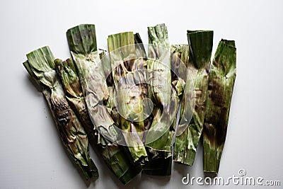 Otak-otak - Traditional food from Indonesia is a kind of snack - grilled fish cakes wrapped with banana leaf Stock Photo