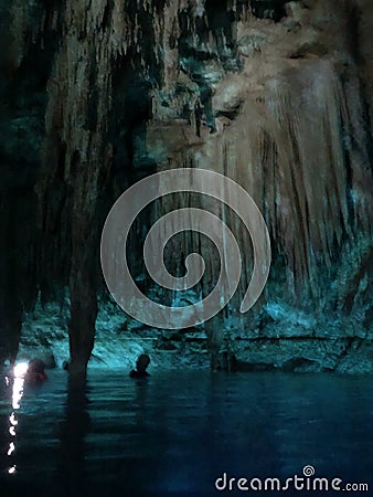 Cenote cavern in Yucatan, Mexico with crystal clear water. Stock Photo