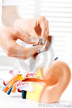 Otolaryngologist, selection of hearing aid. Stock Photo