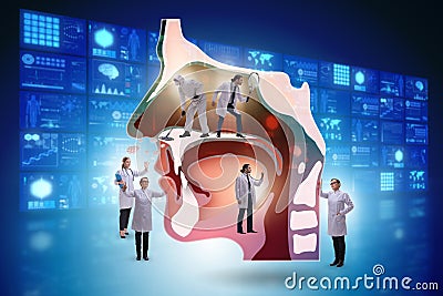 Otolaryngology concept with doctors treating patient Stock Photo