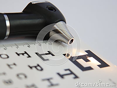 Otoscope and eyechart Stock Photo