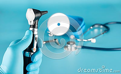 Otoscope, stethoscope, and reflector for detecting disorders of the patient Stock Photo