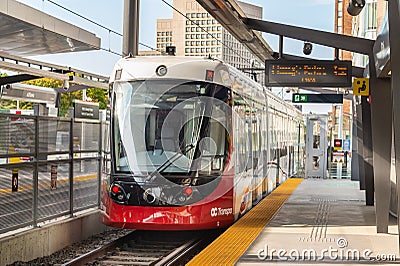 OC Transpo Train leaving uOttawa Station Editorial Stock Photo