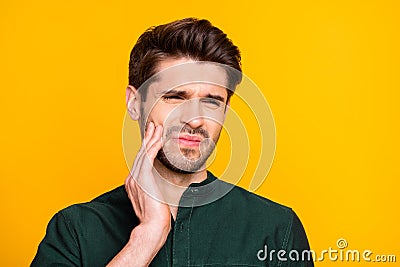 Ouch. Close up photo of upset sad guy feel ill suffer from disease toothache touch his cheek face cry need medical Stock Photo