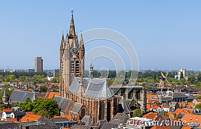 Oude Kerk, is a historic church in Delft, Netherlands, is a 75-meter-high brick tower that leans about two meters from the Stock Photo
