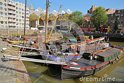 Oudehaven Harbor with colorful historical houseboats and Cube houses Kijk Kubus in the background, Rotterdam Stock Photo