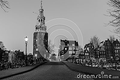 Oudeschans Canal and Montelbaanstoren Tower in Amsterdam Editorial Stock Photo