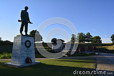 Copenhagen, Denmark - July 2021: Our Fallen statue and a bridge leading to the entrance of the Kastellet Editorial Stock Photo