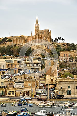 The Our Lady of Lourdes church on the hillside, Gozo island, port Mgarr, Malta Editorial Stock Photo