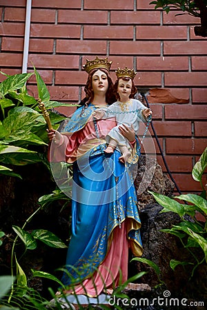 Our lady of perpetual help statue virgin Mary with Child Jesus in the church, Thailand. selective focus. Stock Photo