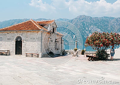 Our Lady of the Rock island and Church in Perast on shore Editorial Stock Photo