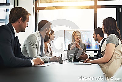 Our people are our most valuable resource. corporate businesspeople meeting in the boardroom. Stock Photo