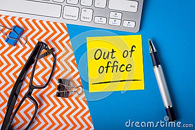 Out of office - memo on office workplace. Holiday Announcement, Day Off or Quarantine Covid-19 Stock Photo