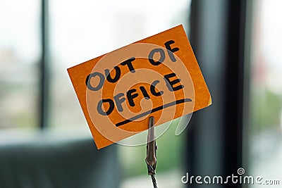 Ut of office written on a memo Stock Photo
