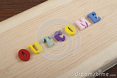 OUTCOME word on wooden background composed from colorful abc alphabet block wooden letters, copy space for ad text Stock Photo