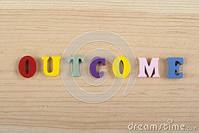 OUTCOME word on wooden background composed from colorful abc alphabet block wooden letters, copy space for ad text Stock Photo