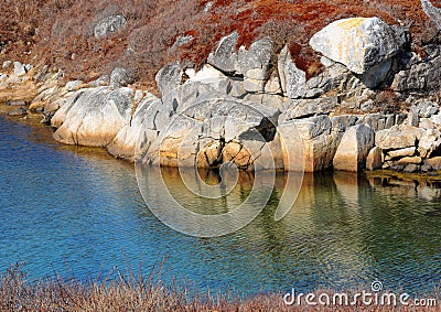 Outcrop and water Stock Photo