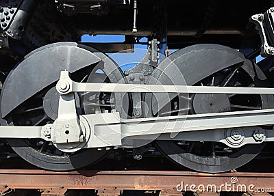 Outdated black train wheels background Stock Photo