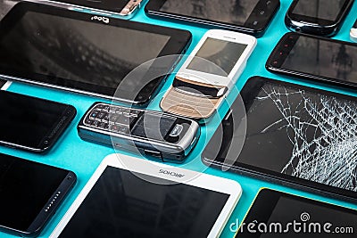 Outdated and modern models of smartphones and mobile phones Editorial Stock Photo