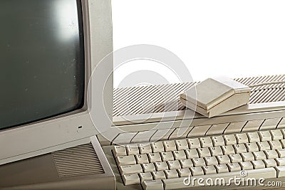 Outdated technology. Dirty vintage computer system with keyboard Stock Photo