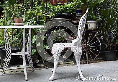 Outdoor bistro chair and table on small cafe terrace Stock Photo