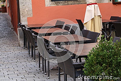 Outdoor brown cafe tables and chairs Stock Photo