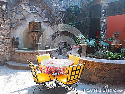 Outdoor cafe in courtyard in historic san miguel allende Stock Photo