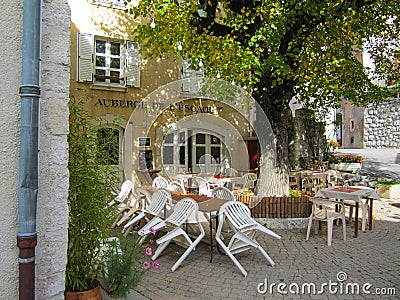 An outdoor cafe in a little hillside town in France Stock Photo