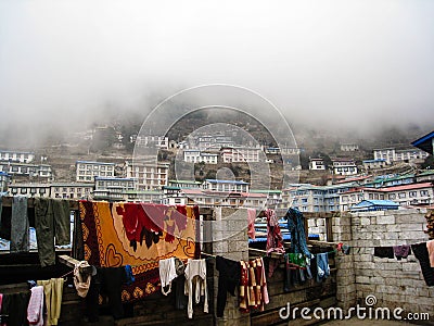 Outdoor clothing at Namche Bazaar in fog Editorial Stock Photo