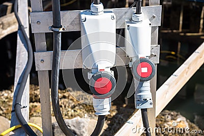 Outdoor electric sockets in a harbour Stock Photo