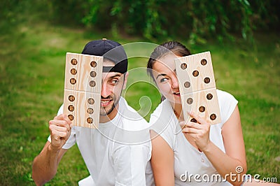 Outdoor games - dominoes, giant outdoor game on green grass Stock Photo