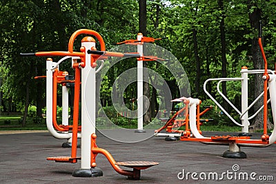 Empty outdoor gym with air walker, ovate stepper, twister and surfer Stock Photo