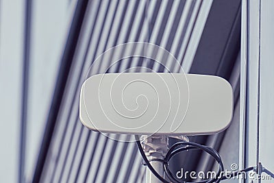 Outdoor internet access point on the wall of an office building Stock Photo