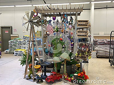 An outdoor lawn ornament display at an Ace Hardware retail store in Orlando, Florida Editorial Stock Photo