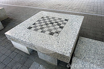 Outdoor Marble Chess and Checkers Table and Stools Stock Photo