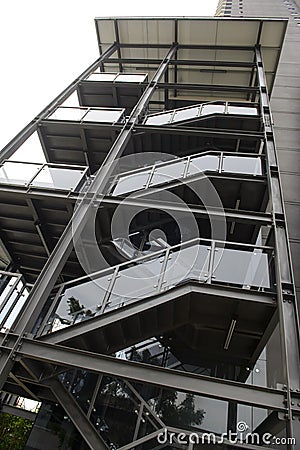 Outdoor metal black emergency staircase outside a building Stock Photo