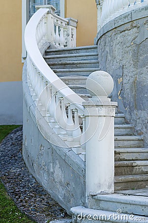 Outdoor old style spiral stairs with column Stock Photo