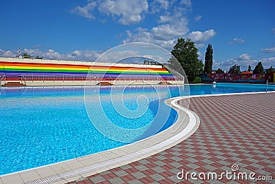 Outdoor pool with water attractions and blu sky Stock Photo