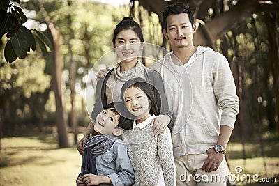 Outdoor portrait of asian family Stock Photo