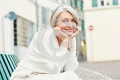 Outdoor portrait of beautiful middle age woman Stock Photo