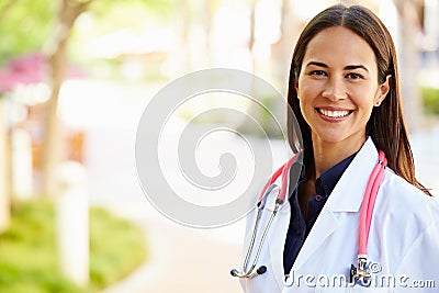 Outdoor Portrait Of Female Doctor Stock Photo