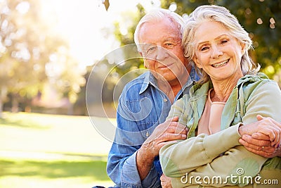 Outdoor Portrait Of Loving Senior Couple Stock Photo