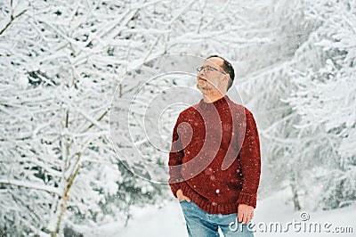 Portrait of middle age man, 55 - 60 years old, enjoying nice cold day Stock Photo