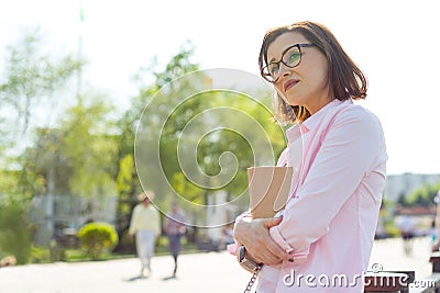 Outdoor portrait middle aged woman Stock Photo