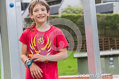 Outdoor portrait of young happy smiling teen boy Stock Photo