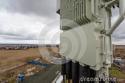 Outdoor remote radio unit of GSM DCS UMTS LTE is as part of communication equipment of basic station are installed on Stock Photo