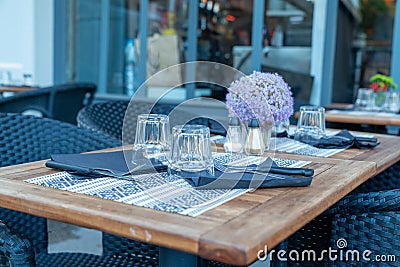 Outdoor restaurant table set up simple summer elegant Stock Photo