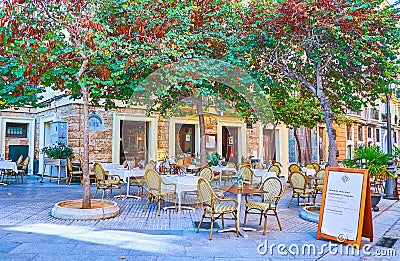 Outdoor restaurants in Calle Plocia, Cadiz, Spain Editorial Stock Photo